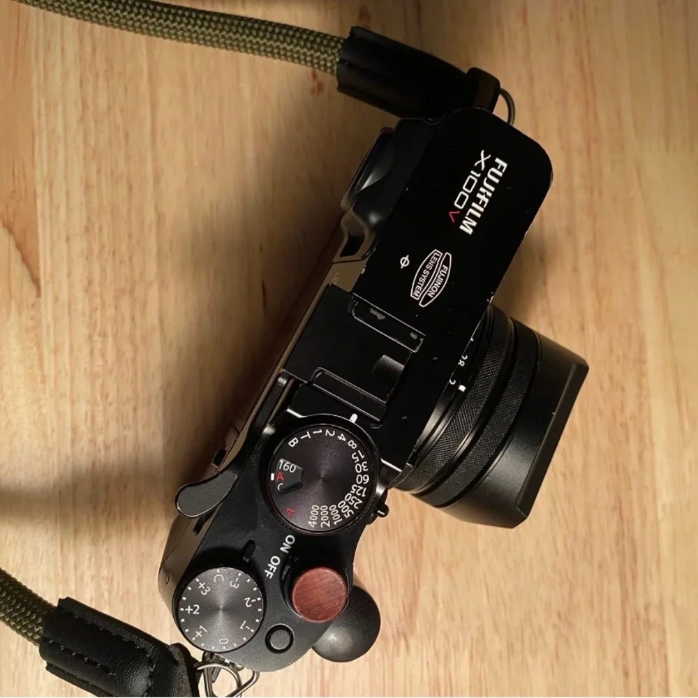 Fujifilm Black Camera with Olive Strap
